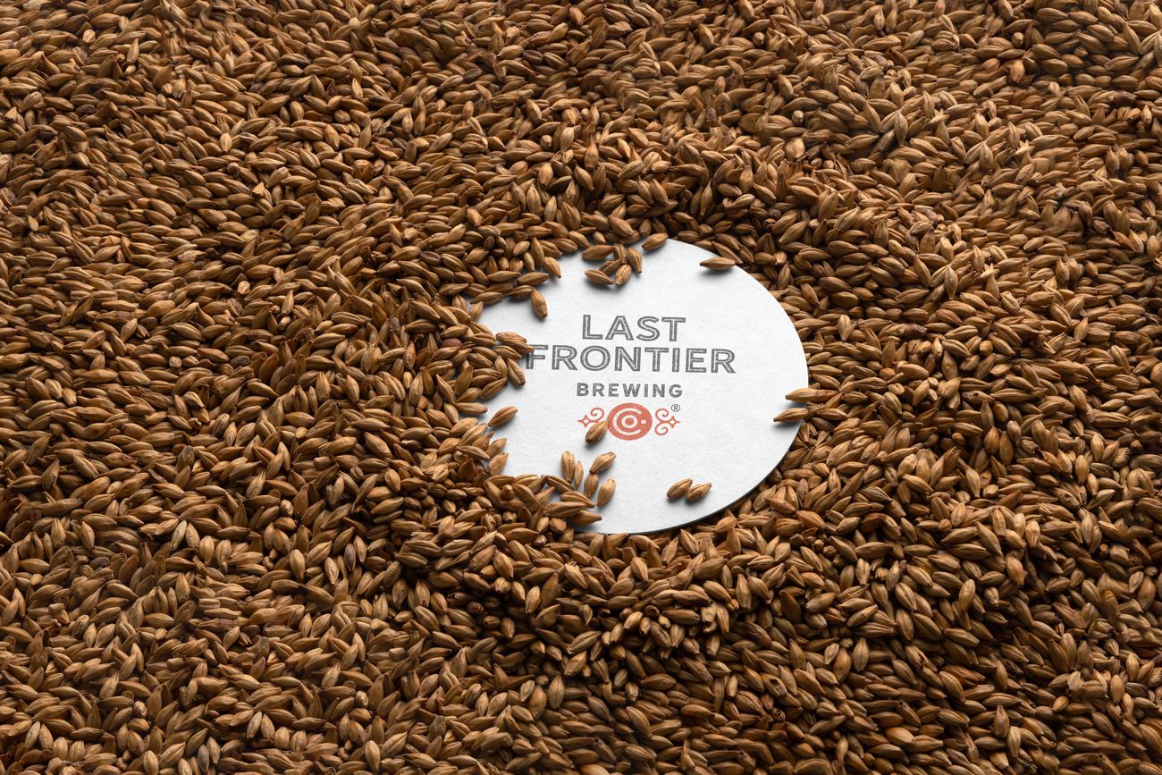 Last Frontier Brewing coaster on malted barley